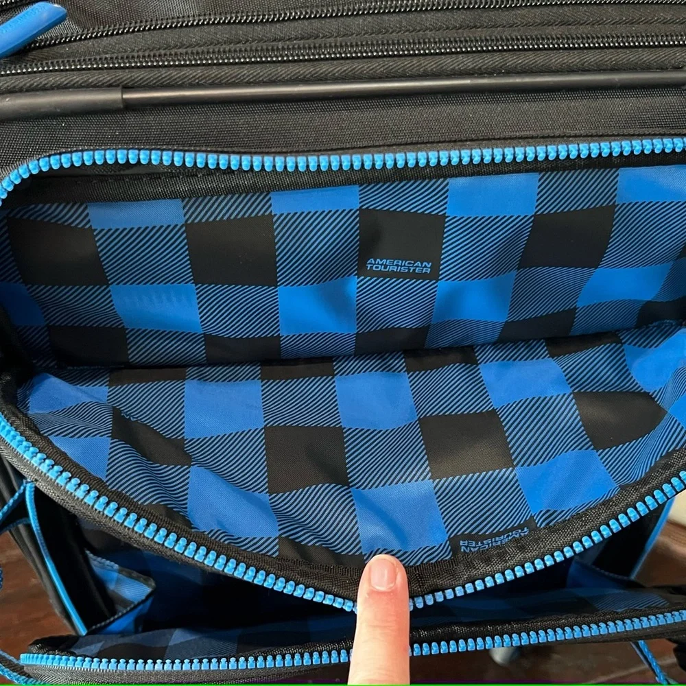American Tourister Black and Blue Carry-On Spinner Suitcase